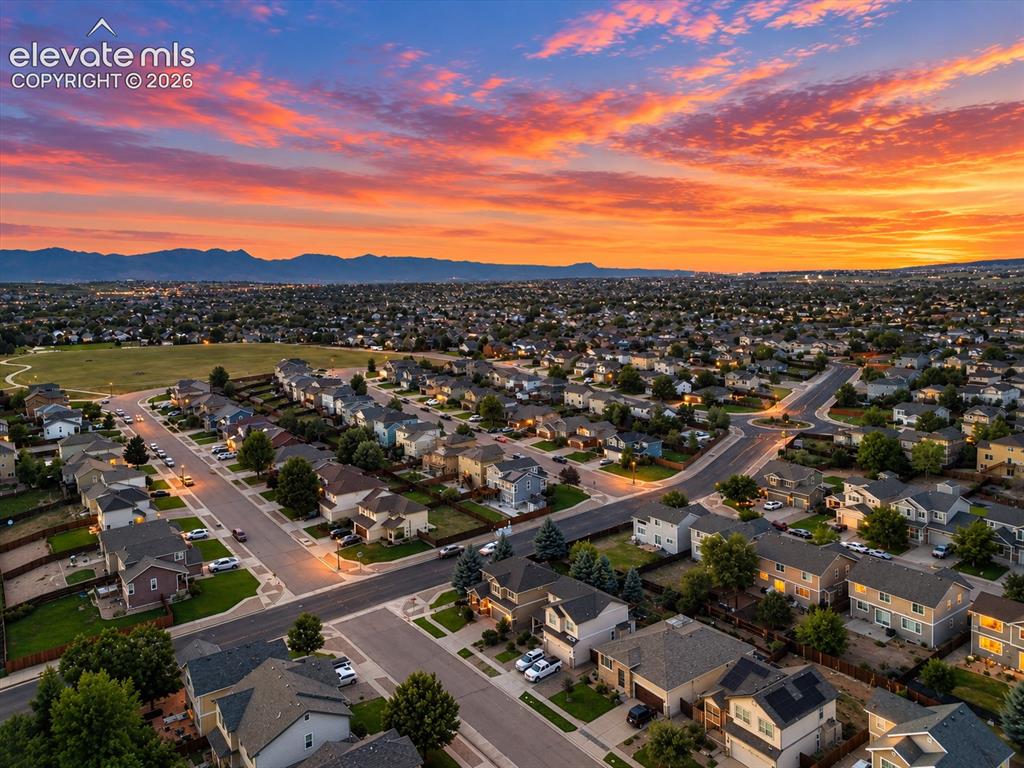 Image 48 of 50: Sweeping mountain views frame the neighborhood, with the nearby park just m