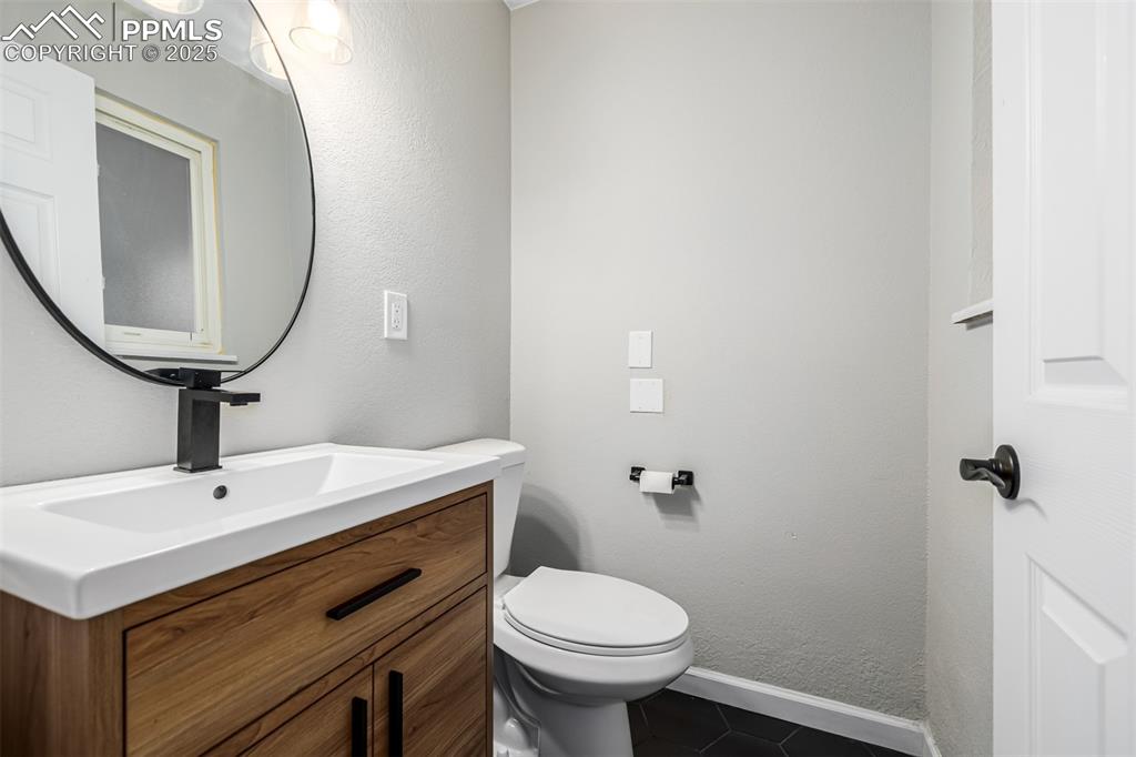 Image 13 of 42: Half bath connected to Primary Bedroom