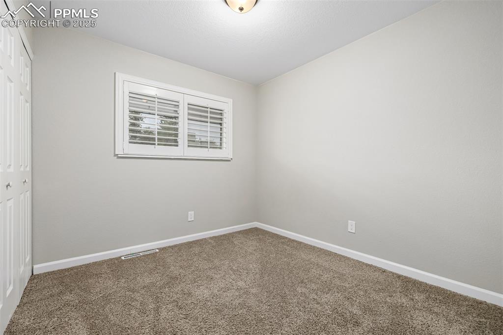 Image 14 of 42: Second Bedroom