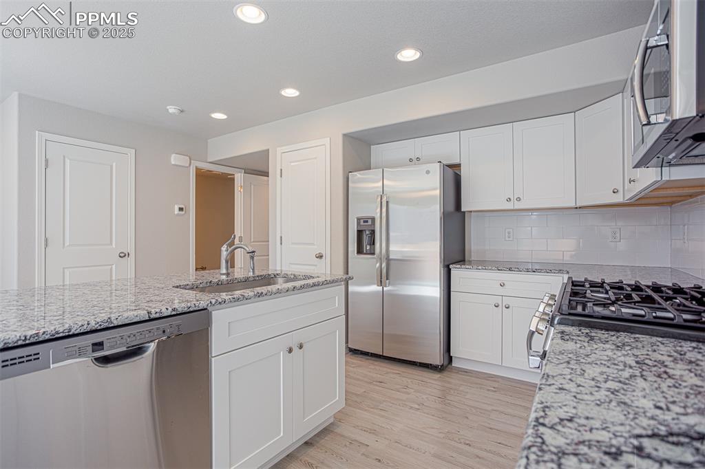 Image 11 of 30: **Photos of previously built home of same floor plan.