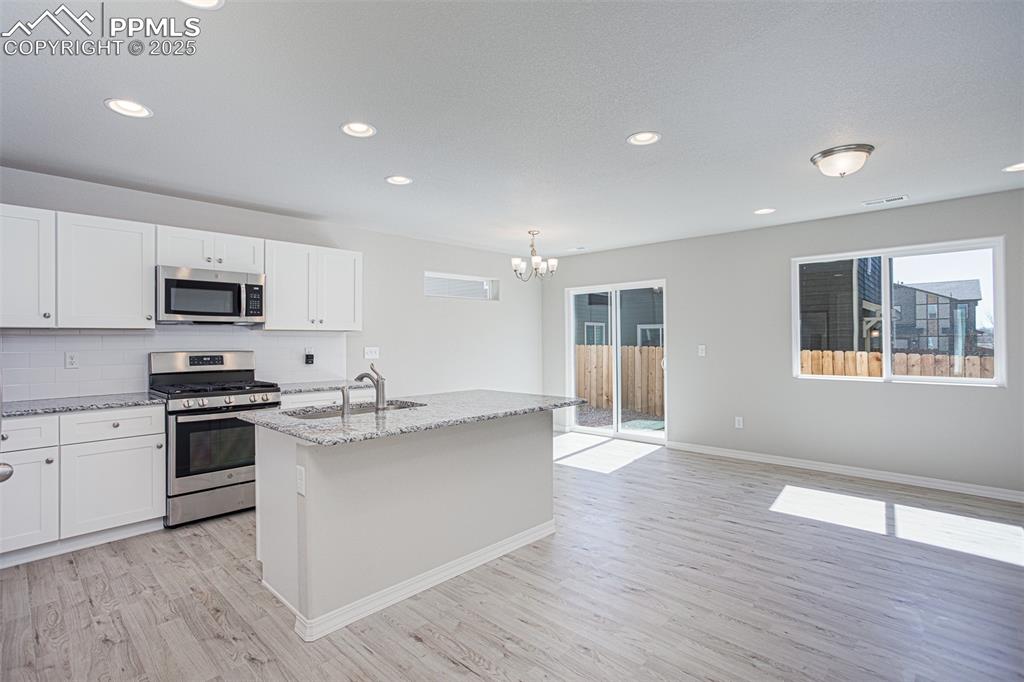Image 5 of 30: **Photos of previously built home of same floor plan.