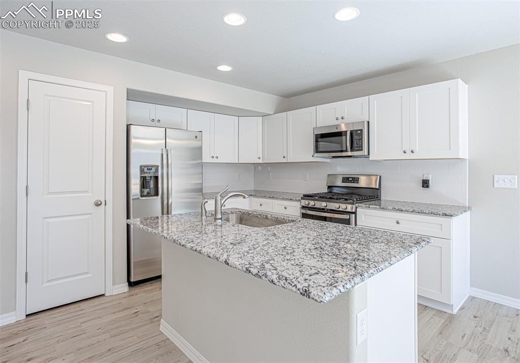 Image 6 of 30: **Photos of previously built home of same floor plan.