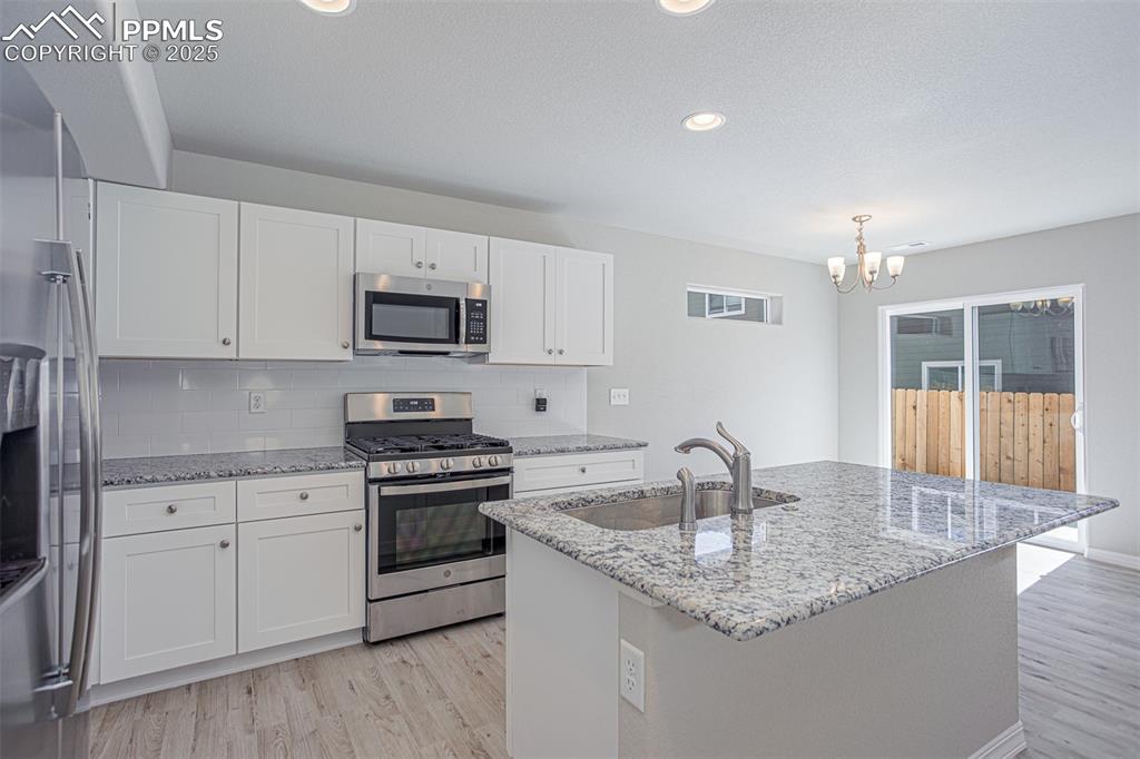 Image 8 of 30: **Photos of previously built home of same floor plan.