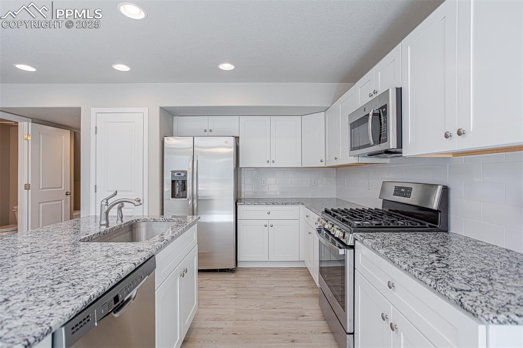 Image 9 of 30: **Photos of previously built home of same floor plan.