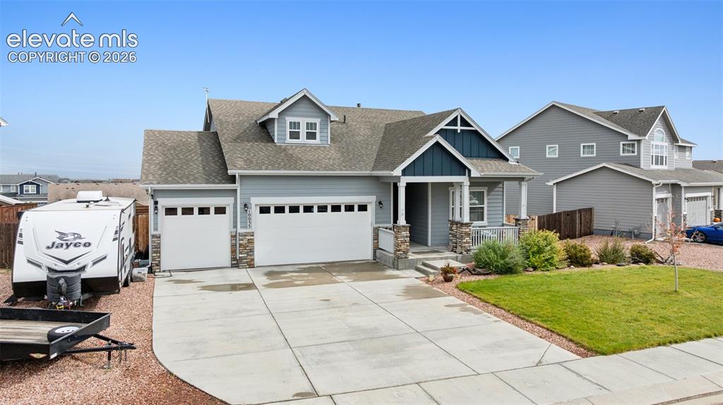 Image 3 of 40: Nice landscaping and easy care living.