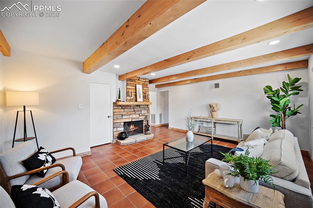 Image 9 of 41: Woodburning fireplace.