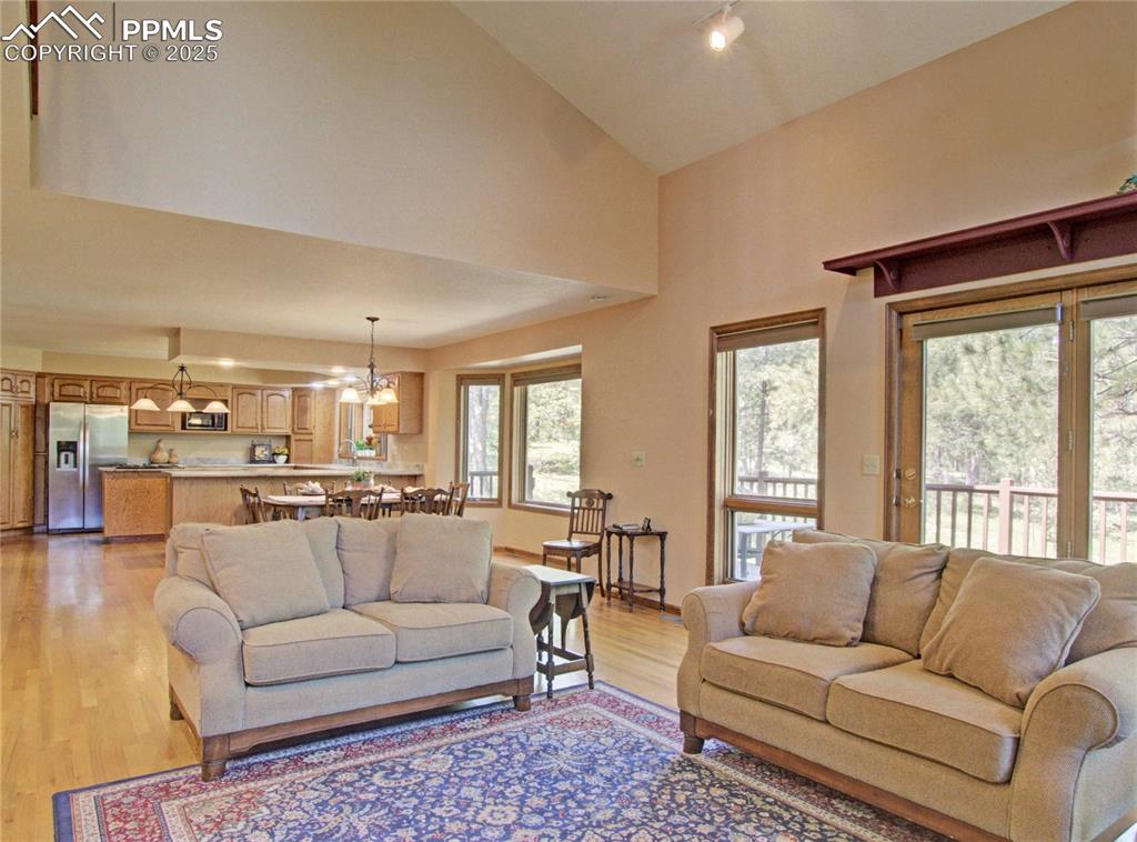 Image 15 of 40: View from great room looking toward the kitchen. Lots of windows and walk o