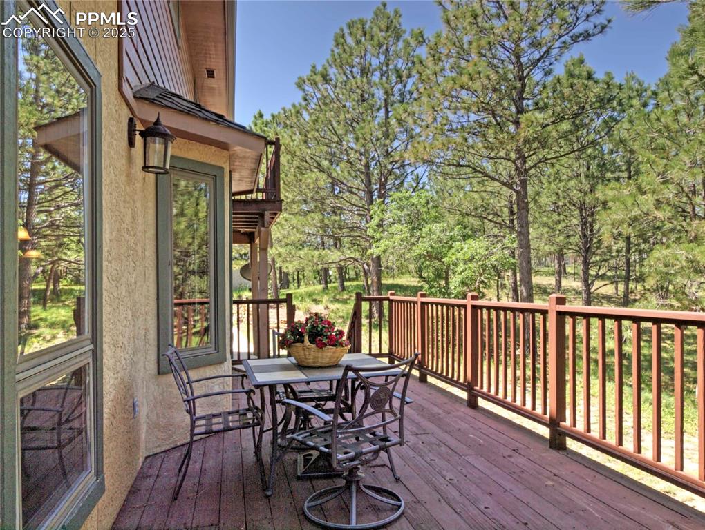 Image 17 of 40: Great room walks out to the large deck. 