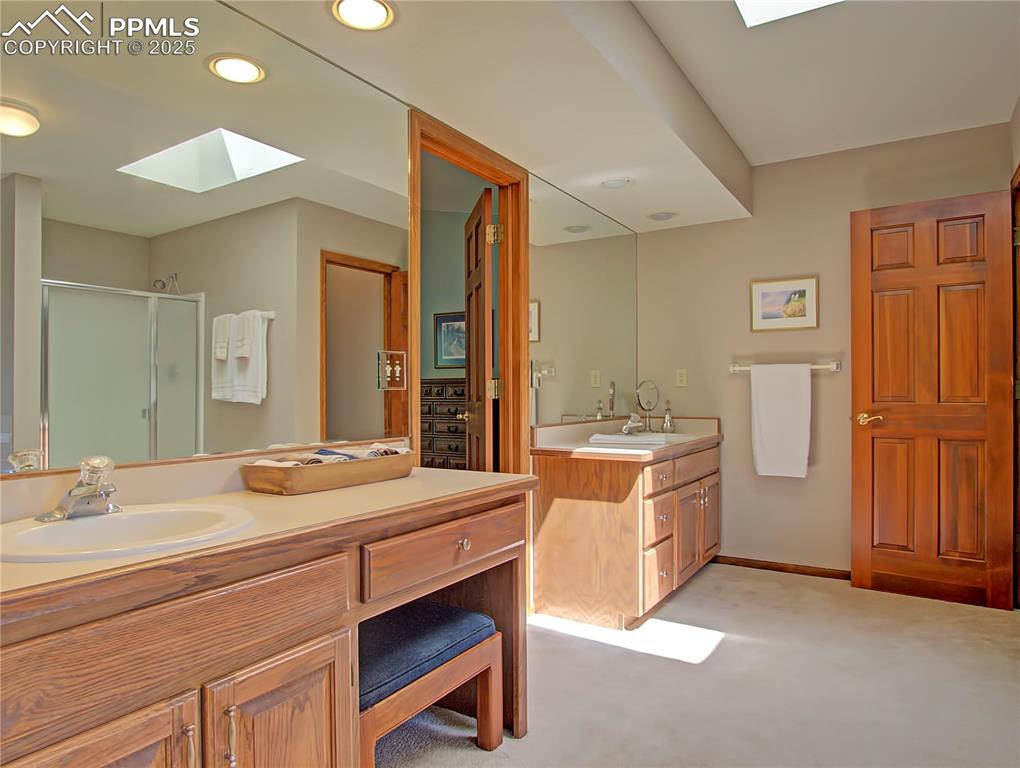 Image 25 of 40: 5 piece master bathroom is sizable...door on the right leads to private tol