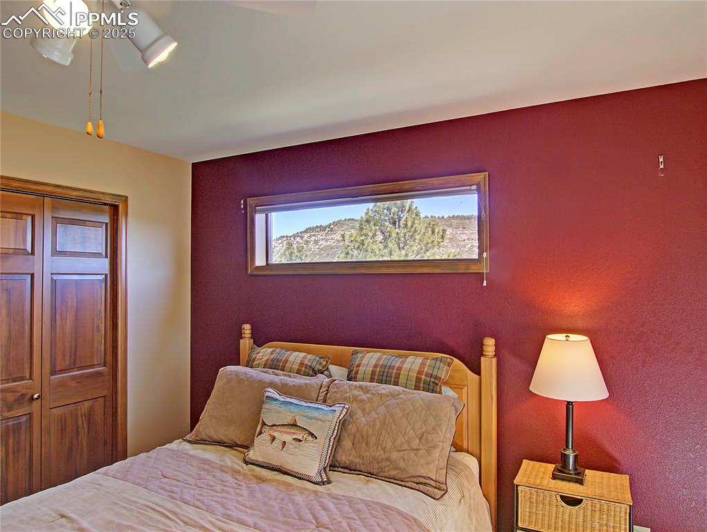 Image 29 of 40: Stunning views of rocks to the north from this bedroom window