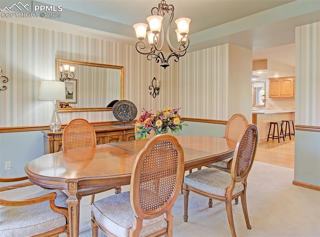 Image 6 of 40: Dining room is located just off the kitchen.
