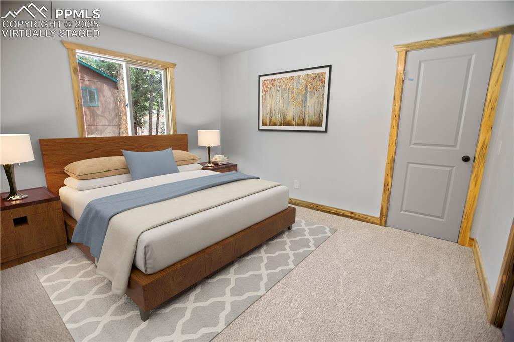 Image 11 of 49: Primary bedroom  - Virtually Staged