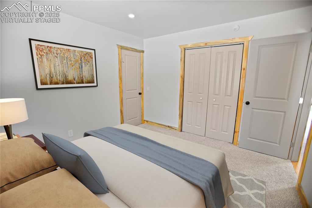 Image 12 of 49: Primary bedroom  - Virtually Staged