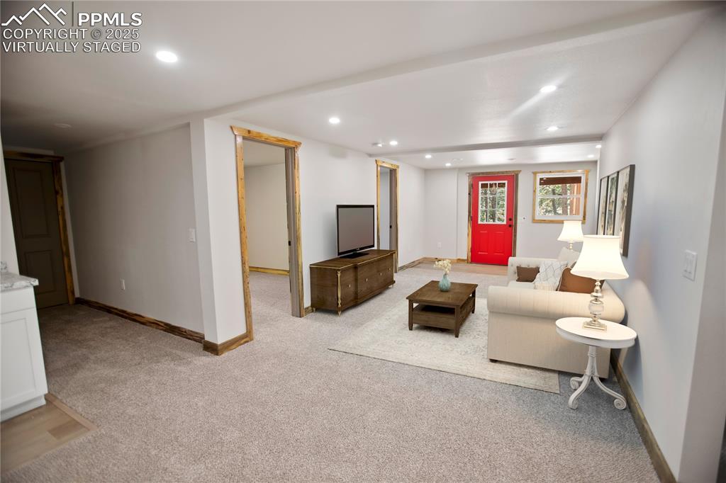 Image 17 of 49: Lower level family room  - Virtually Staged