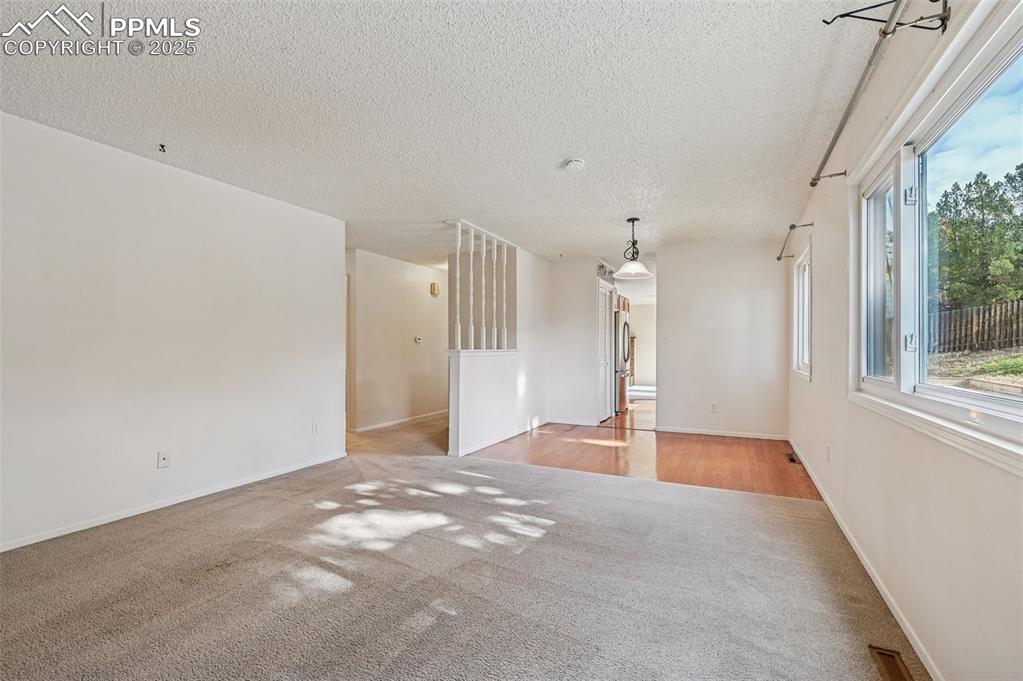 Image 13 of 36: Family Room/Dining Area