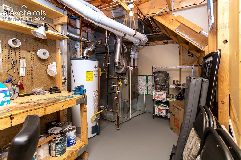 Image 37 of 50: Utility Room is Basement also has indoor Storage Space