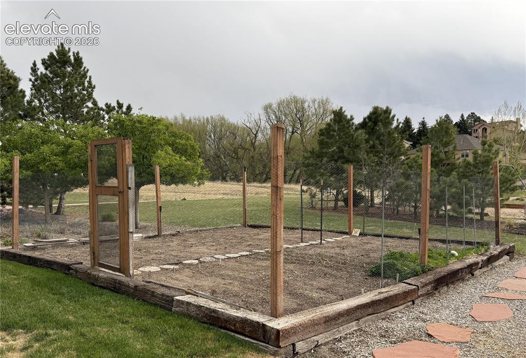 Image 43 of 50: "Deer Proof" enclosed Garden has a Built-in Irrigation System
