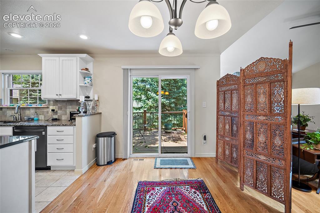 Image 14 of 48: Open Floor plan. The divider can be easily moved and taken down.