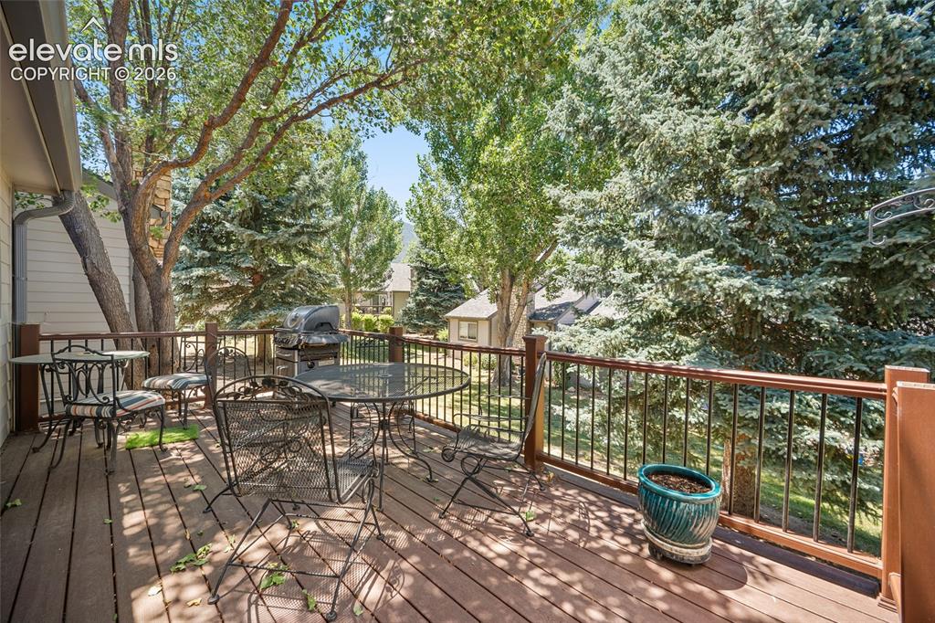 Image 2 of 48: Large Deck off of the Kitchen/Living area.