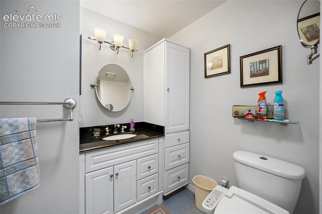 Image 21 of 48: Granite counter top and Plenty of storage.