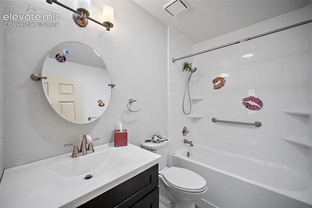 Image 23 of 48: Hallway bathroom.