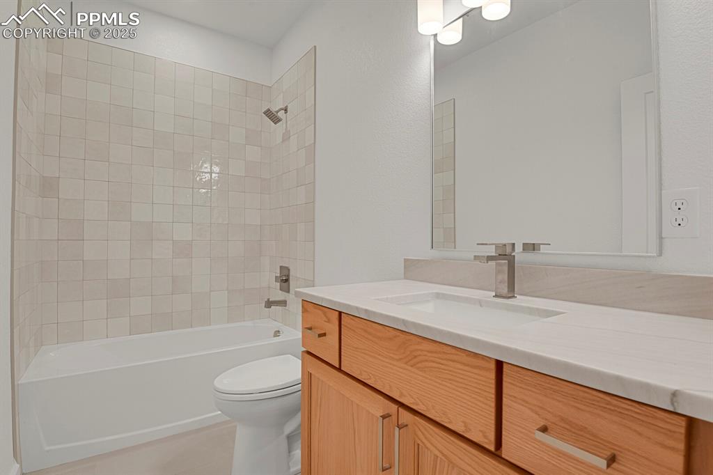 Image 15 of 49: Main level full bath