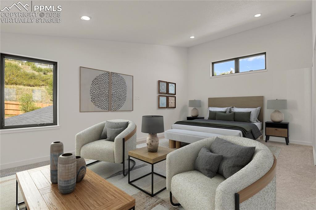 Image 18 of 49: Upper level loft/secondary suite. Virtually Staged