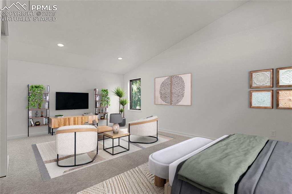 Image 19 of 49: Upper level loft/secondary suite. Virtually Staged