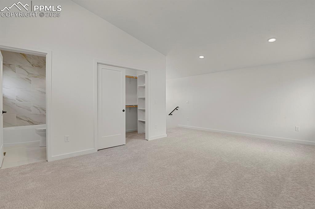 Image 24 of 49: Upper level loft/secondary suite