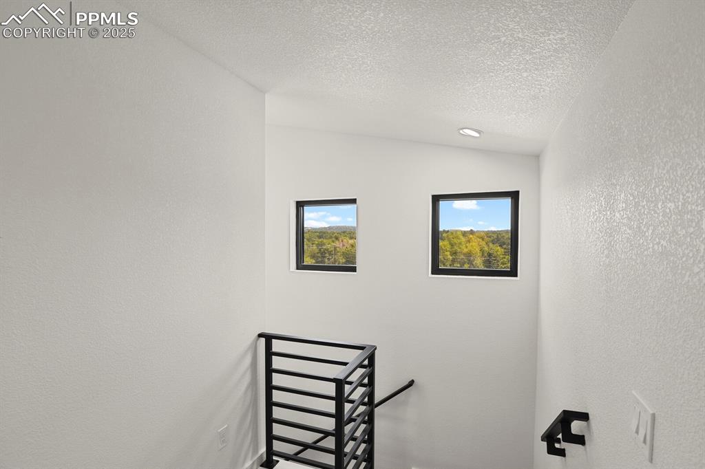 Image 25 of 49: Front view from upper level