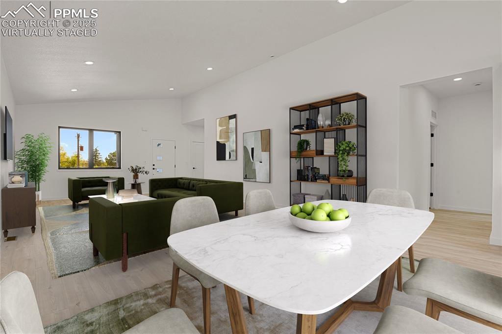 Image 5 of 49: Open main level with Mohawk luxury vinyl flooring. Virtually Staged