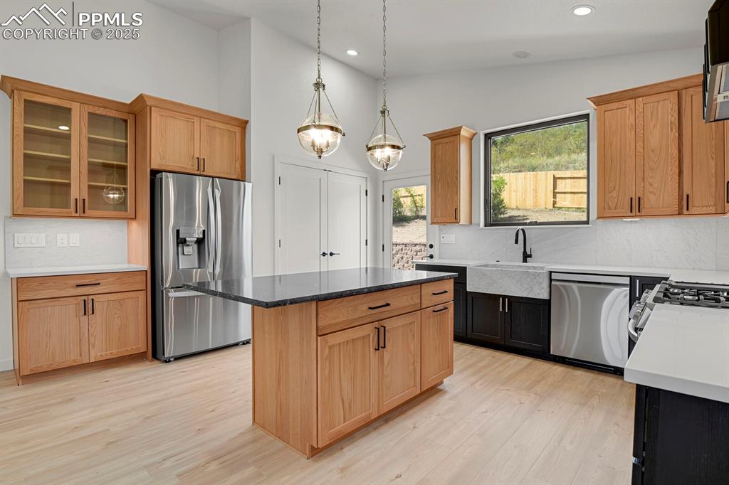 Image 7 of 49: Gourmet kitchen with custom cabinetry from Plush Designs
