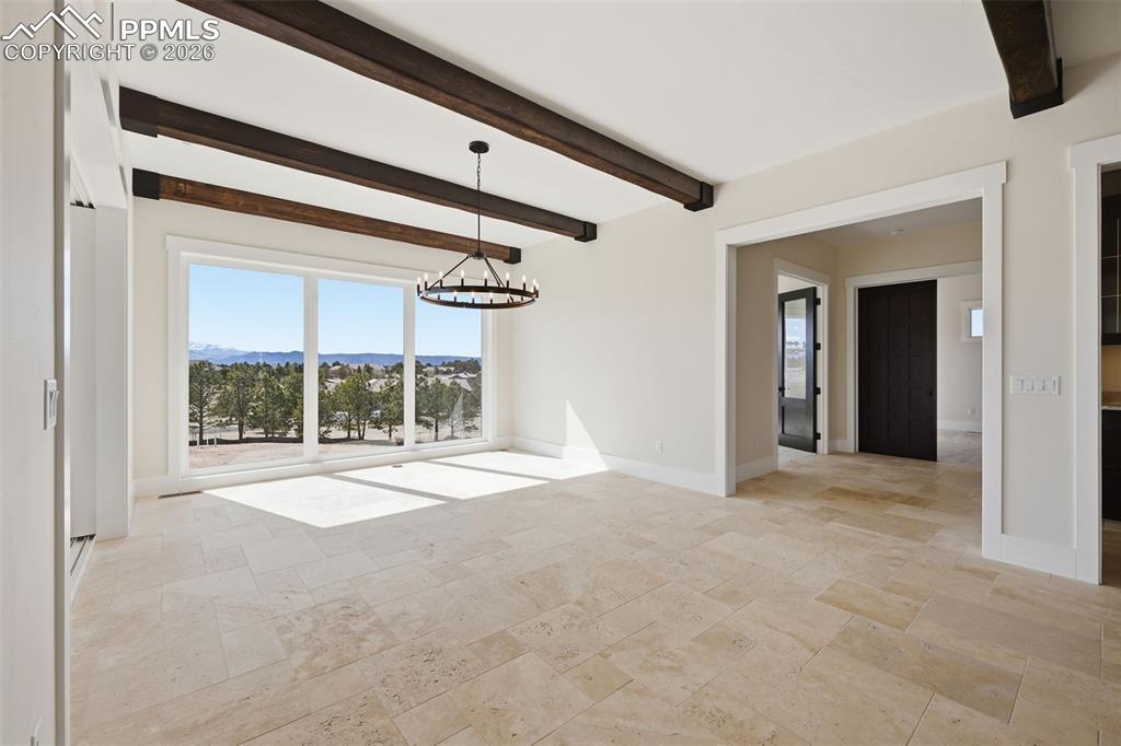 Image 14 of 45: Dining Room, hall entry to Office and Master Suite.