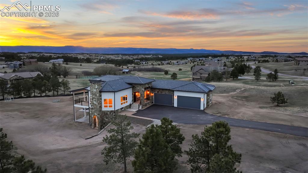 Image 6 of 45: Aerial view at dusk looking northwest.