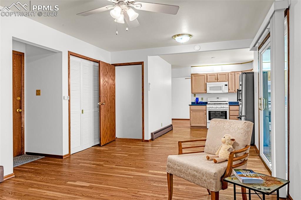 Image 14 of 44: View of the kitchen from the living room