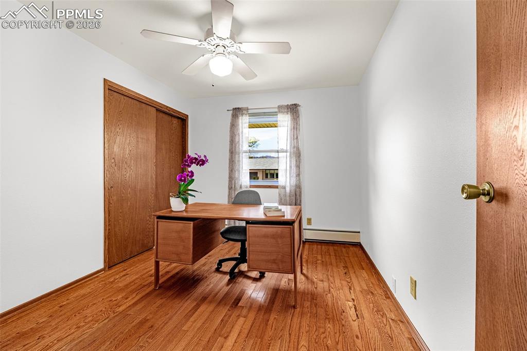 Image 17 of 44: Main floor bedroom that can serve as an office