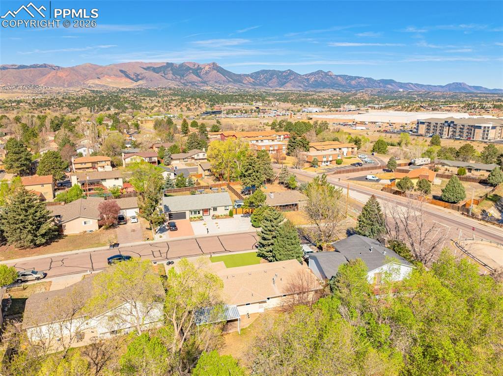 Image 42 of 44: This property is situated within a vibrant community, surrounded by mature 