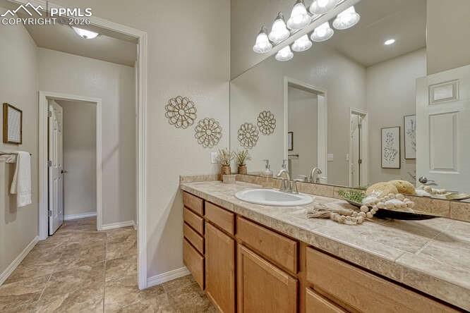 Image 12 of 41: Primary En Suite Bathroom with a separate toilet room