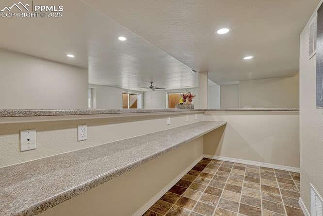 Image 23 of 41: Plenty of counter space in this giant bar area!