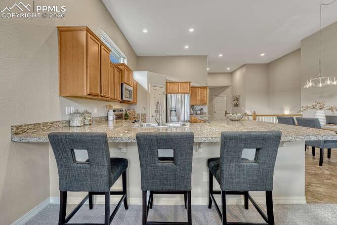 Image 32 of 41: Eat in bar area with plenty of space!