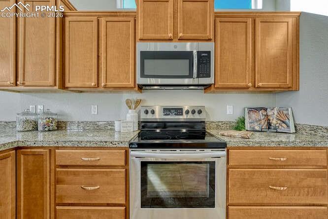 Image 35 of 41: Plenty of cabinet space in this chef