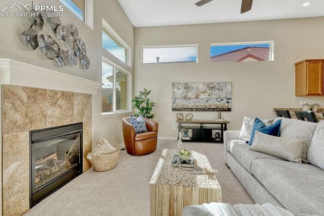 Image 7 of 41: Gas Log fireplace, Brand New High End Carpet, New Paint and new Lighting!!