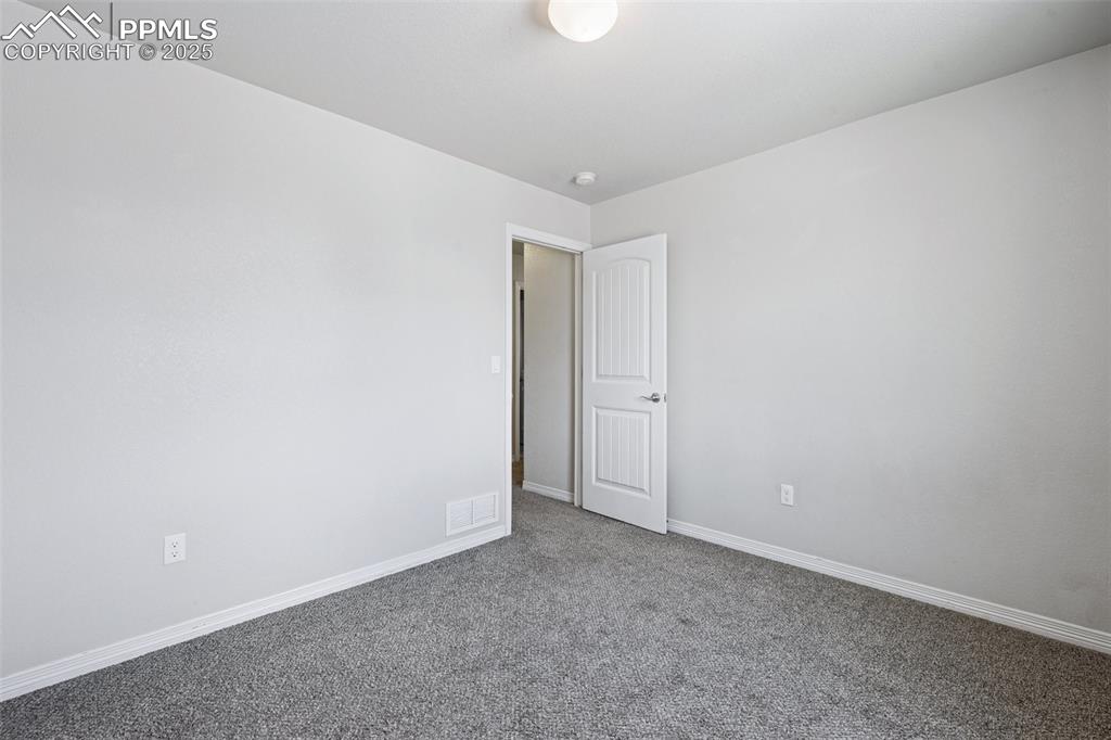 Image 21 of 24: Bedroom