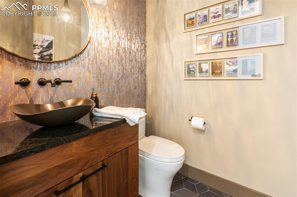 Image 23 of 48: Main floor powder room