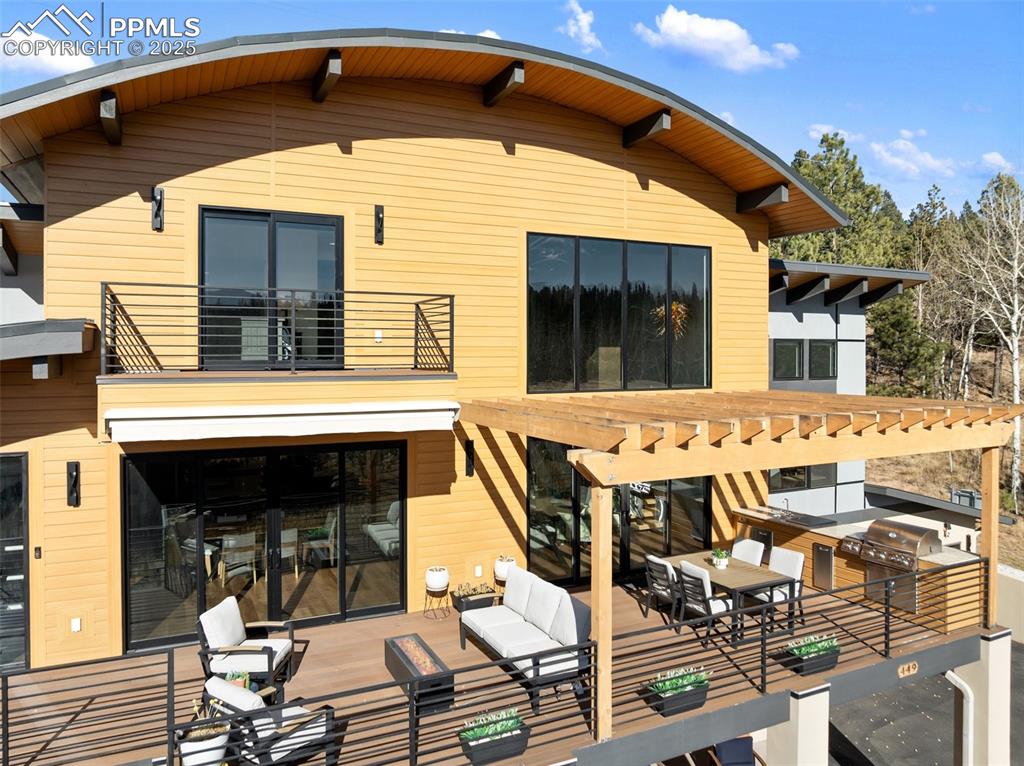 Image 3 of 48: Sunny and south facing front deck- perfect for entertaining! 