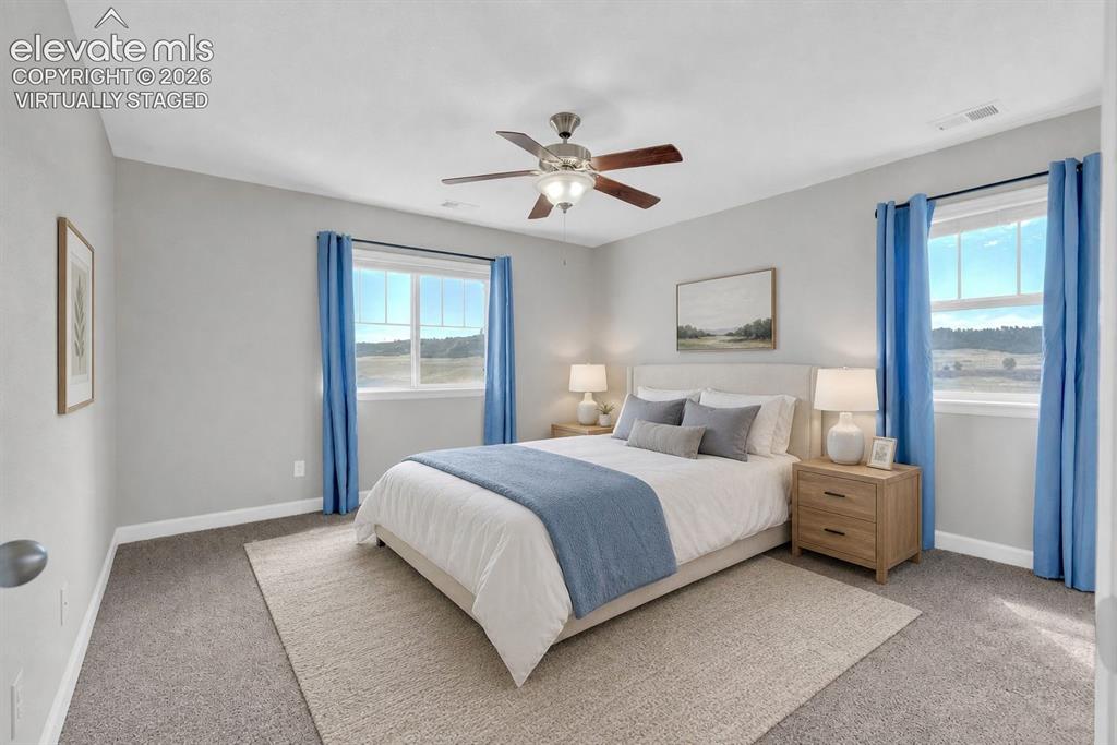 Image 25 of 49: Virtually staged. Secondary bedroom with en-suite bathroom. 