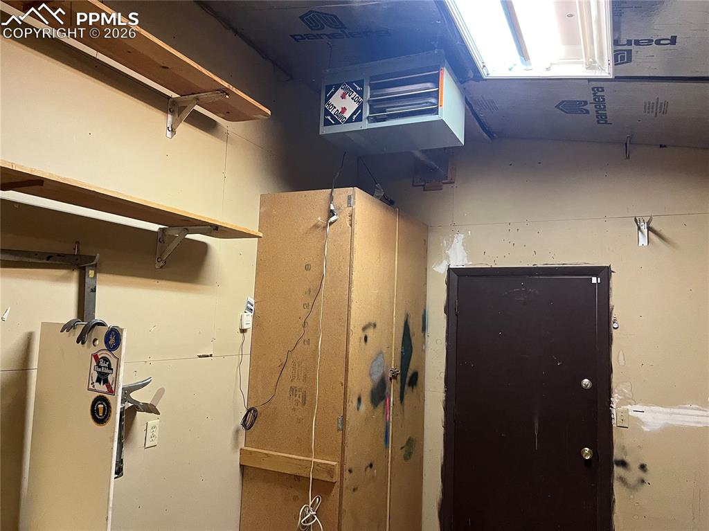 Image 16 of 26: Shop heater