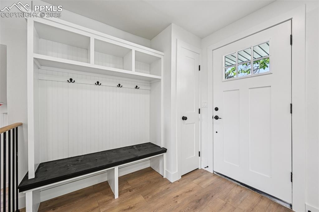 Image 15 of 49: Mudroom with light wood-type flooring