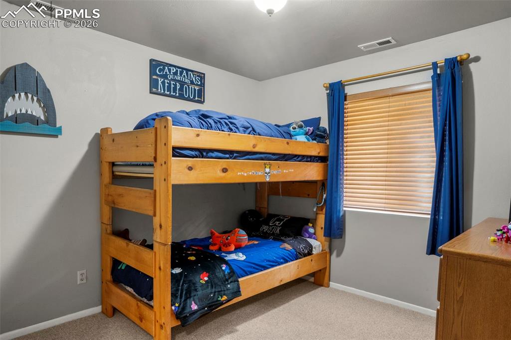 Image 18 of 38: Bedroom