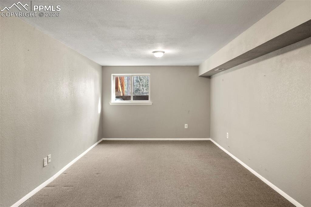 Image 22 of 38: Bedroom